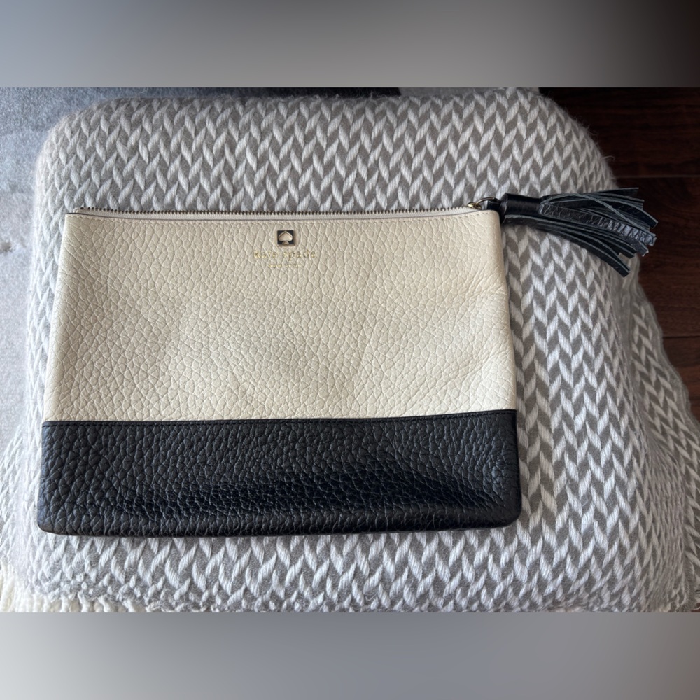 Kate Spade - black and white leather clutch with tassel